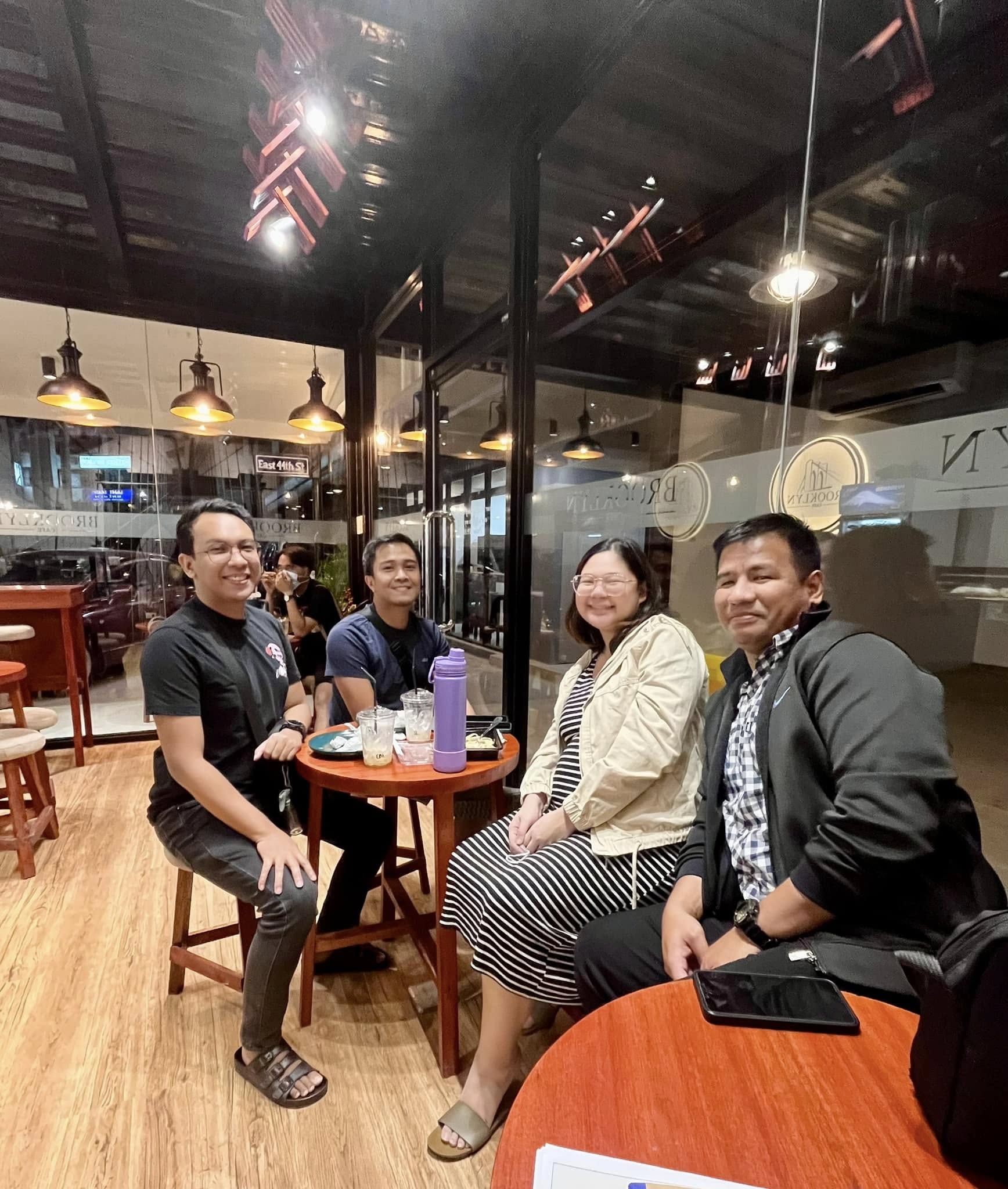 Guests around a table beside the counter
