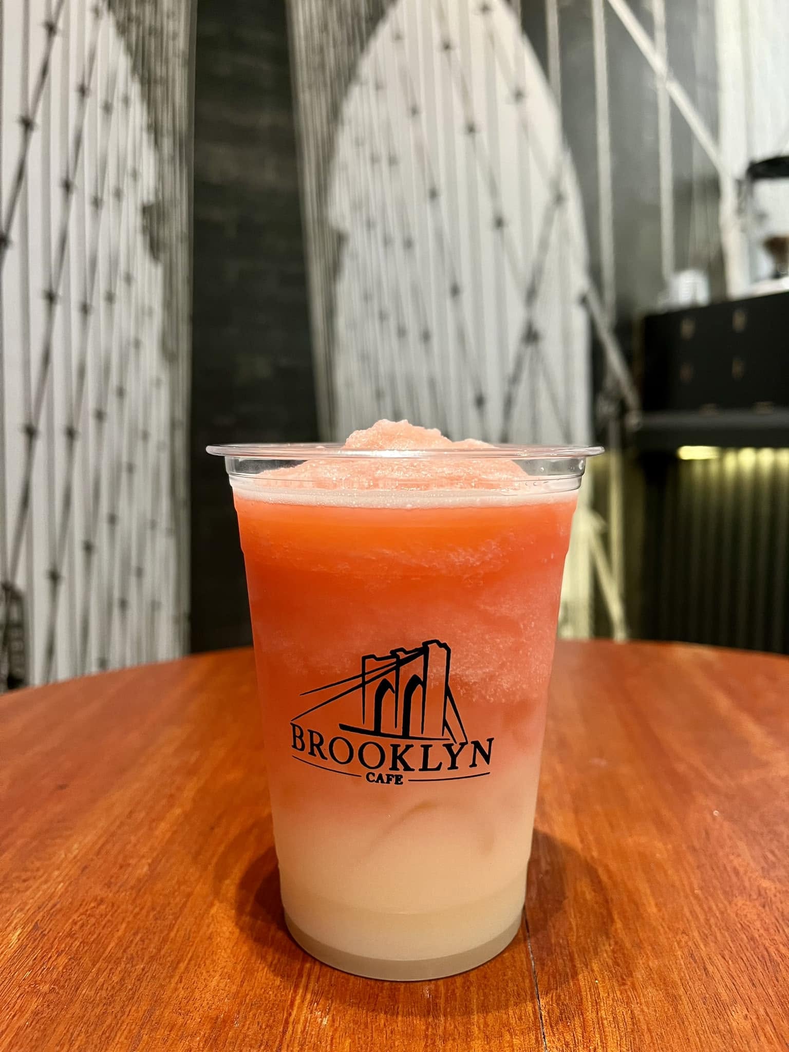 A Strawberry Lychee Refresher in a Brooklyn Cafe cup